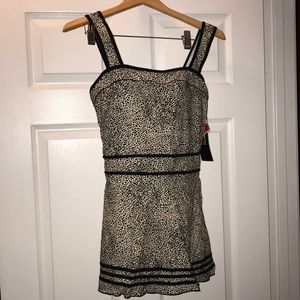 One piece skirted swimsuit